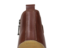 Bota Step UP Bobux Iberia para los primeros pasos del bebé, calzado respetuoso en color toffee con diseño cómodo y flexible.