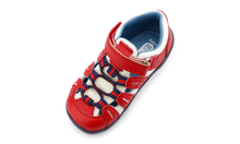 Calzado deportivo Step Up Summit de BOBUX en rojo y azul marino para los primeros pasos del bebé, con diseño cómodo y resistente.